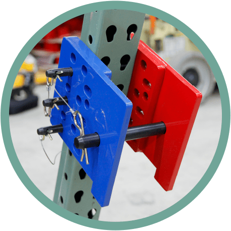 Blue and red metal plates with pins are mounted on a metal rack